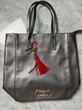 Carolina Herrera Metallic Gray Tote with Red Tassel Charm